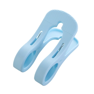 Large blue plastic windproof clothes clip for heavy blankets and bedsheets on white background