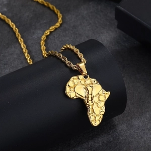 Gold plated Africa map pendant necklace detail shot, stainless steel rope chain jewelry.