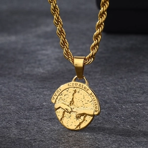 Gold stainless steel rope chain necklace with textured Creator spiritus pendant detail close up