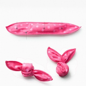 Pink polka dot sponge hair roller set showing flat, knotted and rabbit ear styling shapes