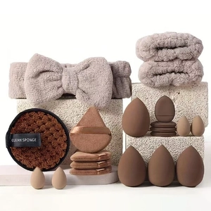 Detail view of 40pc makeup set including hairband, sponges, and beauty blenders