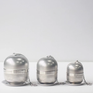 Set of 3 stainless steel mesh tea infusers with chains and drip trays in varied sizes