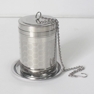 Detail view of SUS304 stainless steel tea infuser with hexagonal mesh and chain