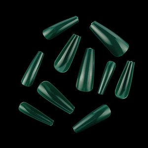 Detail of ten translucent dark green coffin press on nails displayed on a black background