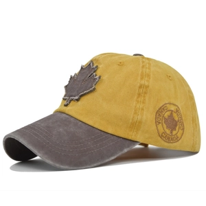 Detailed close-up of vintage washed cotton baseball cap with Canada maple leaf embroidery