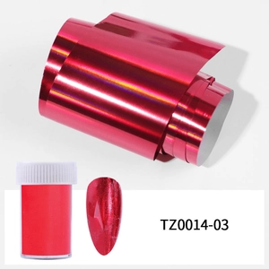 Detail of red metallic nail foil roll with storage bottle and decorative nail tip