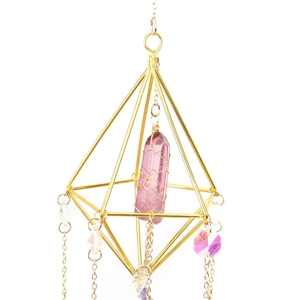 Golden geometric prism suncatcher with pink crystal pillar and faceted hanging beads