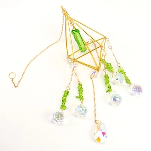 Golden suncatcher with green crystal stone prism and hanging faceted crystal beads