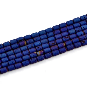 Macro detail of 6x8mm blue barrel druzy agate beads with natural crystal texture for DIY jewelry