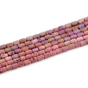 Macro shot of 6x8mm pink purple gradient druzy agate barrel beads with matte stone texture