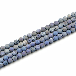 Detailed view of 10mm blue natural stone beads with raw rock texture for DIY jewelry making