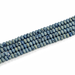 Macro shot of 5x8mm blue geode agate beads with unique natural textured surface