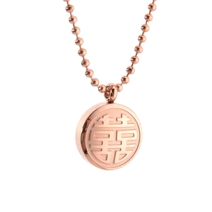 Detailed view of rose gold beaded necklace with a circular Double Happiness pendant