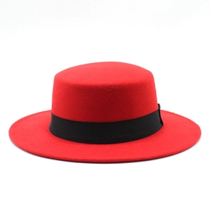 Detailed side view of a red wool felt boater hat with flat brim and black satin ribbon band