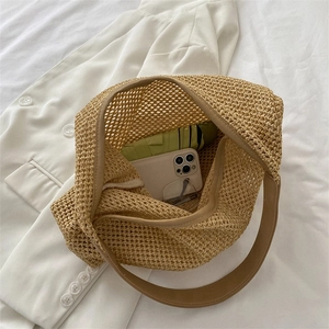 Chic woven beach tote with PU leather trim and hollow mesh design for summer travel