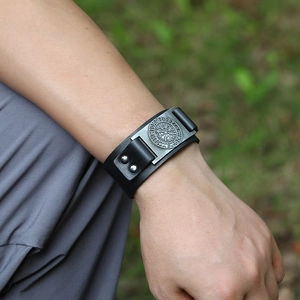 Nordic Viking Compass leather bracelet with silver rivets on a male wrist