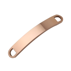 Detailed macro view of curved rose gold stainless steel rectangle connector with dual holes