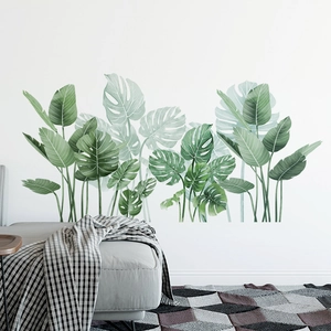Tropical monstera and banana leaf wall decals in watercolor green for home living room decor