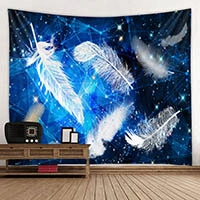 Detail view of deep blue wall tapestry featuring white feather and geometric star patterns