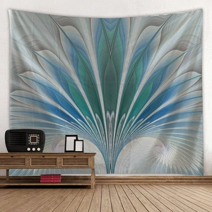 Abstract teal radial fan pattern tapestry hanging in a cozy living room setup