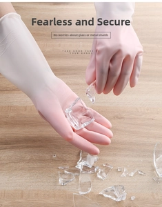 Detail of puncture resistant pink latex gloves showing protection against sharp glass shards