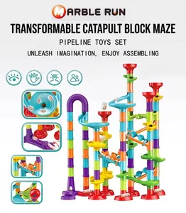 Detailed close-up of colorful marble run track pieces and vertical tower assembly