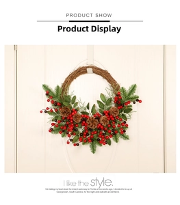 Close-up of Christmas wreath featuring natural pine cones, red berries, and pine needles