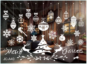 Detailed view of white Christmas window stickers featuring reindeer and snowflakes
