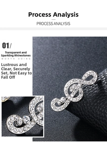 Detailed macro shot of a music note brooch with shimmering white rhinestones and silver alloy