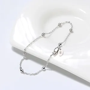 Detailed close-up of S925 sterling silver bead bracelet with Italy hallmark engraving