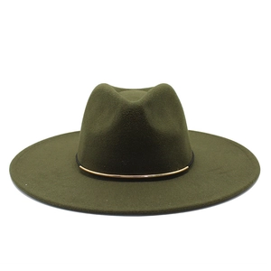 Detail of dark olive wool fedora hat featuring a thin black band and gold metallic buckle
