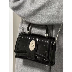 Glossy black faux-crocodile leather handbag with silver chain strap and metal clasp lock