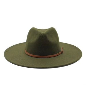 Detail of olive green wool fedora showing brown leather band and metallic buckle