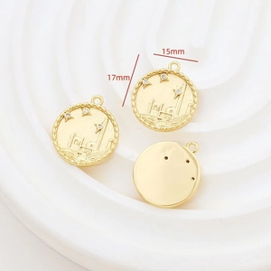 Detail of 15mm gold-plated round charm with zircon inlay and architectural relief