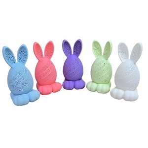Detail of five 3D printed LED Easter bunny egg lamps in assorted vibrant colors