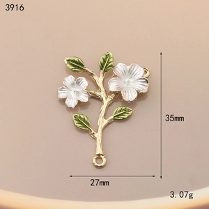 Detailed macro view of white flower and green leaf alloy charm with 35mm height dimensions
