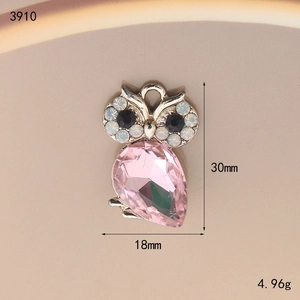 Pink owl pendant with drop-shaped crystal and sparkling rhinestones in silver finish