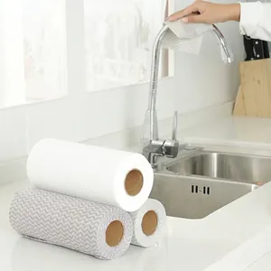 Disposable non-woven cleaning cloths in white and grey wave patterns for kitchen use