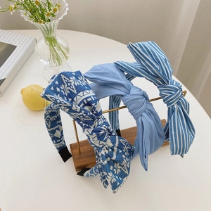 Three-piece set of denim fabric bow headbands with geometric patterns and stripes