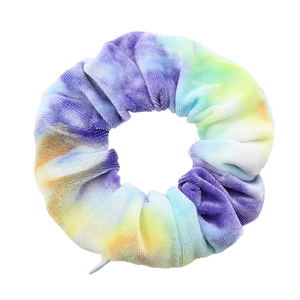 Detail shot of tie-dye velvet scrunchie with zipper pocket in purple and yellow tones