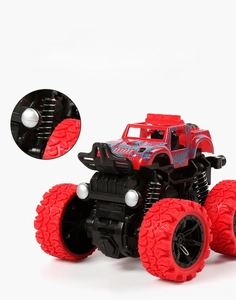 Close-up of four-wheel drive toy truck showing independent suspension springs and red tires