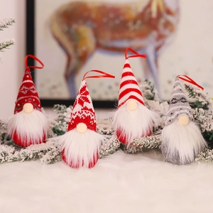 Set of 4 knitted Christmas forest gnome ornaments with long plush beards and snowy branches