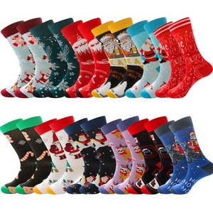 Detailed view of assorted Christmas socks with Santa, reindeer and snowflake patterns