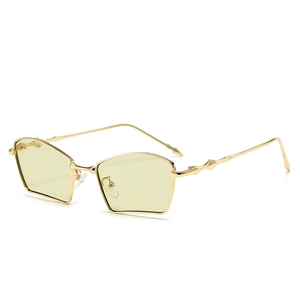 Fashionable geometric metal frame sunglasses with gold finish and tinted yellow lenses