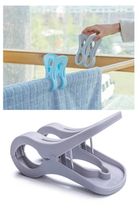 Detail of large windproof laundry clips for blankets with strong springs and non-slip grips