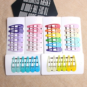 Colorful 5cm matte metal snap hair clips for kids on white cards with gradient finishes