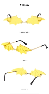 Three-view display of yellow bat-shaped rimless sunglasses with gold metal temples