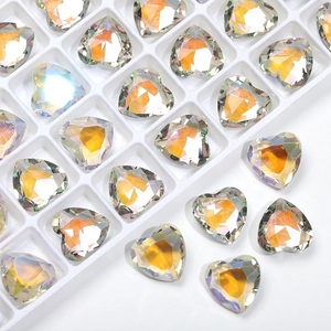Macro detail of 12mm iridescent heart-shaped glass crystals for DIY crafts and accessories