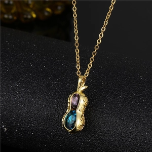 Titanium steel necklace with crystal peanut pendant featuring purple and blue gemstones