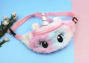 Detailed macro view of rainbow plush unicorn bag with shiny horn and cute eyes